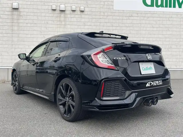 ホンダ シビック ハッチバック ホンダセンシング 山形県 2019(平31)年 9.5万km クリスタルブラックパール 禁煙車/ターボ/純正SDナビ/・TV/AM/FM/CD/DVD/Bluetooth/アペックスマフラー/アダプティブクルーズコントロール/アイドリングストップ/レーンキープアシスト/標識認識機能/衝突被害軽減ブレーキ/横滑り防止装置/盗難防止装置/LEDヘッドライト/オートライト/フロントフォグランプ/電動パーキングブレーキ/バックカメラ/前後ドライブレコーダー/シートヒーター（D/N席）/純正フロアマット/純正ドアバイザー/ETC