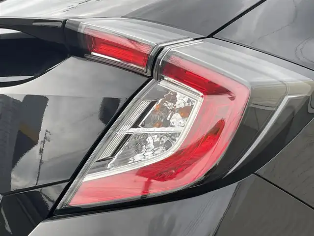 ホンダ シビック ハッチバック ホンダセンシング 山形県 2019(平31)年 9.5万km クリスタルブラックパール 禁煙車/ターボ/純正SDナビ/・TV/AM/FM/CD/DVD/Bluetooth/アペックスマフラー/アダプティブクルーズコントロール/アイドリングストップ/レーンキープアシスト/標識認識機能/衝突被害軽減ブレーキ/横滑り防止装置/盗難防止装置/LEDヘッドライト/オートライト/フロントフォグランプ/電動パーキングブレーキ/バックカメラ/前後ドライブレコーダー/シートヒーター（D/N席）/純正フロアマット/純正ドアバイザー/ETC