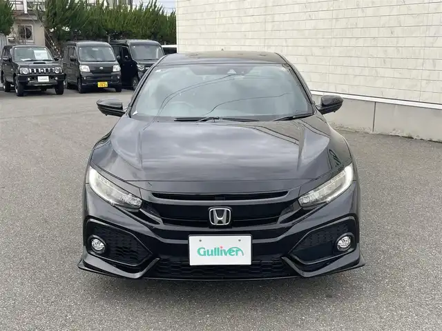 ホンダ シビック ハッチバック ホンダセンシング 山形県 2019(平31)年 9.5万km クリスタルブラックパール 禁煙車/ターボ/純正SDナビ/・TV/AM/FM/CD/DVD/Bluetooth/アペックスマフラー/アダプティブクルーズコントロール/アイドリングストップ/レーンキープアシスト/標識認識機能/衝突被害軽減ブレーキ/横滑り防止装置/盗難防止装置/LEDヘッドライト/オートライト/フロントフォグランプ/電動パーキングブレーキ/バックカメラ/前後ドライブレコーダー/シートヒーター（D/N席）/純正フロアマット/純正ドアバイザー/ETC