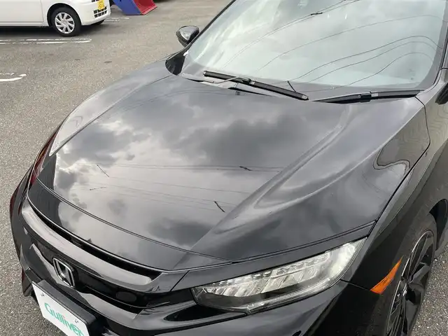 ホンダ シビック ハッチバック ホンダセンシング 山形県 2019(平31)年 9.5万km クリスタルブラックパール 禁煙車/ターボ/純正SDナビ/・TV/AM/FM/CD/DVD/Bluetooth/アペックスマフラー/アダプティブクルーズコントロール/アイドリングストップ/レーンキープアシスト/標識認識機能/衝突被害軽減ブレーキ/横滑り防止装置/盗難防止装置/LEDヘッドライト/オートライト/フロントフォグランプ/電動パーキングブレーキ/バックカメラ/前後ドライブレコーダー/シートヒーター（D/N席）/純正フロアマット/純正ドアバイザー/ETC
