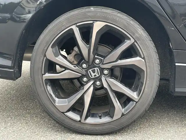 ホンダ シビック ハッチバック ホンダセンシング 山形県 2019(平31)年 9.5万km クリスタルブラックパール 禁煙車/ターボ/純正SDナビ/・TV/AM/FM/CD/DVD/Bluetooth/アペックスマフラー/アダプティブクルーズコントロール/アイドリングストップ/レーンキープアシスト/標識認識機能/衝突被害軽減ブレーキ/横滑り防止装置/盗難防止装置/LEDヘッドライト/オートライト/フロントフォグランプ/電動パーキングブレーキ/バックカメラ/前後ドライブレコーダー/シートヒーター（D/N席）/純正フロアマット/純正ドアバイザー/ETC