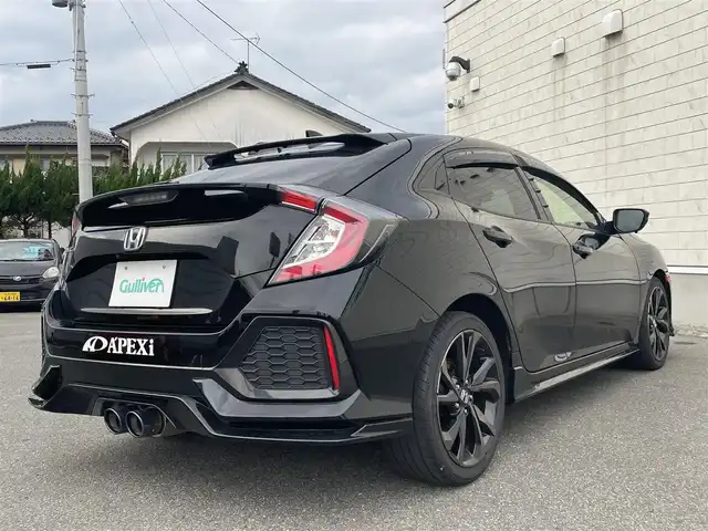 ホンダ シビック ハッチバック ホンダセンシング 山形県 2019(平31)年 9.5万km クリスタルブラックパール 禁煙車/ターボ/純正SDナビ/・TV/AM/FM/CD/DVD/Bluetooth/アペックスマフラー/アダプティブクルーズコントロール/アイドリングストップ/レーンキープアシスト/標識認識機能/衝突被害軽減ブレーキ/横滑り防止装置/盗難防止装置/LEDヘッドライト/オートライト/フロントフォグランプ/電動パーキングブレーキ/バックカメラ/前後ドライブレコーダー/シートヒーター（D/N席）/純正フロアマット/純正ドアバイザー/ETC