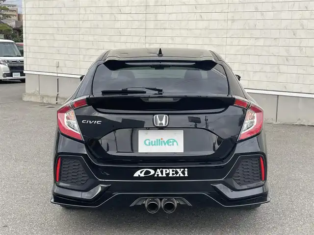 ホンダ シビック ハッチバック ホンダセンシング 山形県 2019(平31)年 9.5万km クリスタルブラックパール 禁煙車/ターボ/純正SDナビ/・TV/AM/FM/CD/DVD/Bluetooth/アペックスマフラー/アダプティブクルーズコントロール/アイドリングストップ/レーンキープアシスト/標識認識機能/衝突被害軽減ブレーキ/横滑り防止装置/盗難防止装置/LEDヘッドライト/オートライト/フロントフォグランプ/電動パーキングブレーキ/バックカメラ/前後ドライブレコーダー/シートヒーター（D/N席）/純正フロアマット/純正ドアバイザー/ETC