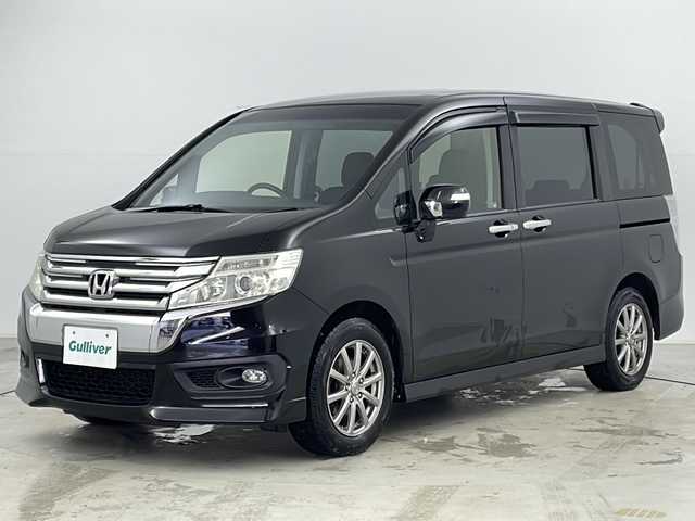 ホンダ ステップワゴン スパーダ Z 道央・札幌 2012(平24)年 15万km プレミアムスパークルブラックパール ・4WD/・ワンオーナー/・社外ナビ＆TV＆CD＆DVD＆BT/・バックカメラ/・両側パワースライドドア/・パドルシフト/・横滑り防止装置/・フロントワイパーデアイサー/・オートライト/・HIDヘッドライト/・アイドリングストップ/・フォグライト/・ETC/・社外エンジンスターター/・純正AW付夏タイヤ積載