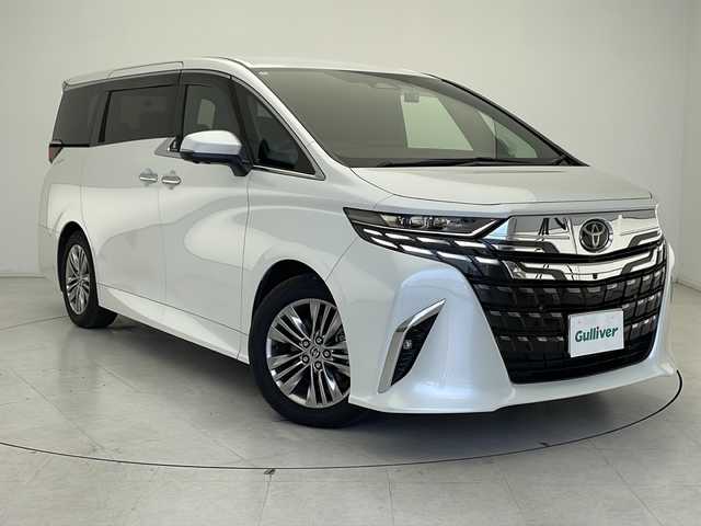 トヨタ アルファードハイブリット Z 千葉県 2024(令6)年 1.3万km プラチナホワイトパールマイカ ワンオーナー/４WD/純正メーカーOPメモリナビ、Bluetooth、/フルセグTV、ミラーキャスト/純正フリップダウンモニター/アラウンドビューモニター/プリクラッシュ/ロードサインアシスト/レーンキープアシスト/クリアランスソナー（前後）/ブラインドスポットモニター/フリップダウンモニター/レーダークルーズコントロール/横滑り防止装置/盗難防止装置/W、サイド、カーテンエアバッグ/オートマチックハイビーム/社外ドライブレコダー（前後録画）/黒レザーシート/２列目オットマン/前席、2列目パワーシート/前席、2列目シートヒーター/前席、2列目エアシート/両側パワースライドドア/パワーバックドア/ウインカーミラー/LEDヘッドライト/ビルトインETC2.0/スマートキー×１/純正フロアマット/純正18インチアルミホイール/スマートキー/皮巻きステアリング/フォグライト/ドアバイザー/TVキャンセラー/整備手帳