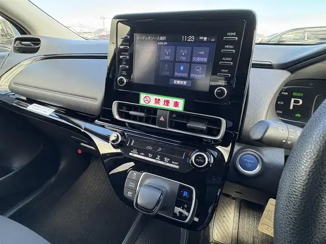 トヨタ アクア X 大分県 2022(令4)年 4.9万km ブラックマイカ ・ナビ(USB/BT/Miracast)/・バックカメラ/・AC100V/・レーダークルーズコントロール/・プリクラッシュセーフティ/・レーンキープアシスト/・ETC/・オートハイビーム/・ステアリングリモコン/・スマートキー/・プッシュスタート