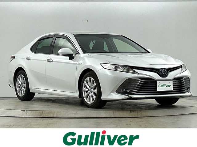 トヨタ カムリ G 愛知県 2018(平30)年 5.1万km プラチナホワイトパールマイカ 禁煙車/純正Tコネクト8インチナビ/(Bluetooth/CD/DVD/SD/USB/フルセグTV/品番：B9108)/バックカメラ/トヨタセーフティセンス/・プリクラッシュセーフティ/・レーダークルーズコントロール/・レーンキープアシスト/・オートマチックハイビーム/・パーキングサポートブレーキ/・リアクロストラフィックアラート/ビルトインETC/ドライブレコーダー/ブラインドスポットモニター/電動パーキングブレーキ/ブレーキホールド/タイヤ空気圧警報システム/車両接近通報装置/クリアランスソナー/運転席パワーシート/ステアリングリモコン/純正17インチホイール/スマートキー/プッシュスタート/LEDヘッドライト/オートライト/フロントフォグランプ/電動格納ドアミラー/ISO FIX