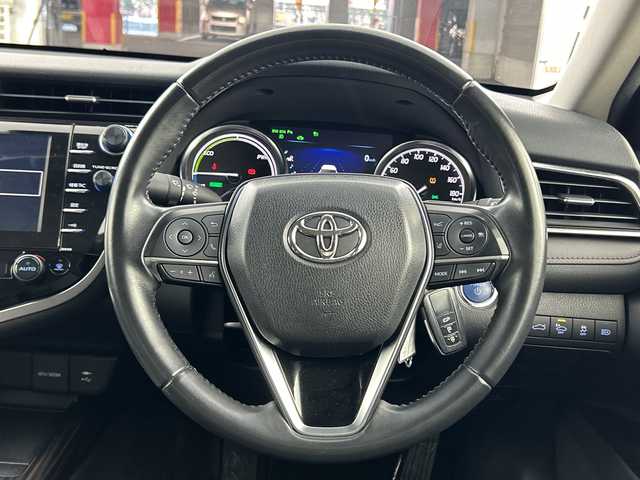 トヨタ カムリ G 愛知県 2018(平30)年 5.1万km プラチナホワイトパールマイカ 禁煙車/純正Tコネクト8インチナビ/(Bluetooth/CD/DVD/SD/USB/フルセグTV/品番：B9108)/バックカメラ/トヨタセーフティセンス/・プリクラッシュセーフティ/・レーダークルーズコントロール/・レーンキープアシスト/・オートマチックハイビーム/・パーキングサポートブレーキ/・リアクロストラフィックアラート/ビルトインETC/ドライブレコーダー/ブラインドスポットモニター/電動パーキングブレーキ/ブレーキホールド/タイヤ空気圧警報システム/車両接近通報装置/クリアランスソナー/運転席パワーシート/ステアリングリモコン/純正17インチホイール/スマートキー/プッシュスタート/LEDヘッドライト/オートライト/フロントフォグランプ/電動格納ドアミラー/ISO FIX