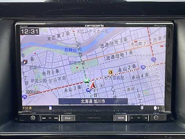 トヨタ ヴォクシー ZS 道北・旭川 2017(平29)年 12.9万km イナズマスパーキングブラックガラスフレーク 寒冷地仕様/社外ナビ/CD/DVD/SD/BT/TV/USB/社外フリップダウンモニター/MOP両側パワースライドドア/横滑り防止/オートライト/オートハイビーム/アイドリングストップ/衝突軽減ブレーキ/レーンキープアシスト/ビルトインETC/革巻きステアリング/ステアリングスイッチ/クルーズコントロール/LEDヘッドライト/フォグ/純正エンジンスターター/純正フロアマット/ドアバイザー
