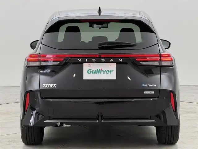 日産 オーラ G レザーエディション 福岡県 2024(令6)年 0.1万km 黒 純正９型ナビ　/全方位カメラ　/ナビ連動前方ドラレコ　/デジタルインナーミラー　/ＥＴＣ　/コーナーセンサー　/エマージェンシーブレーキ　/レーンキープ　/ブラインドスポットモニター　/純正１７インチＡＷ　/ＬＥＤライト