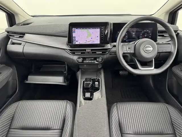 日産 オーラ G レザーエディション 福岡県 2024(令6)年 0.1万km 黒 純正９型ナビ　/全方位カメラ　/ナビ連動前方ドラレコ　/デジタルインナーミラー　/ＥＴＣ　/コーナーセンサー　/エマージェンシーブレーキ　/レーンキープ　/ブラインドスポットモニター　/純正１７インチＡＷ　/ＬＥＤライト