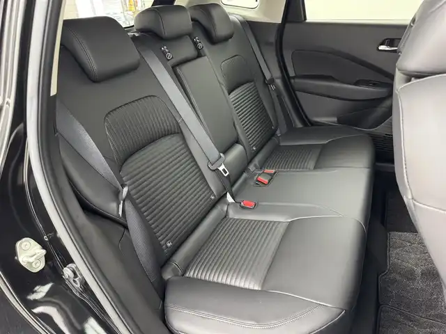 日産 オーラ G レザーエディション 福岡県 2024(令6)年 0.1万km 黒 純正９型ナビ　/全方位カメラ　/ナビ連動前方ドラレコ　/デジタルインナーミラー　/ＥＴＣ　/コーナーセンサー　/エマージェンシーブレーキ　/レーンキープ　/ブラインドスポットモニター　/純正１７インチＡＷ　/ＬＥＤライト