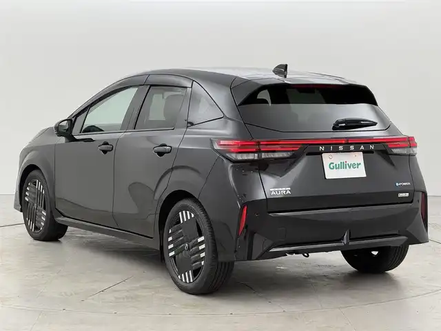 日産 オーラ G レザーエディション 福岡県 2024(令6)年 0.1万km 黒 純正９型ナビ　/全方位カメラ　/ナビ連動前方ドラレコ　/デジタルインナーミラー　/ＥＴＣ　/コーナーセンサー　/エマージェンシーブレーキ　/レーンキープ　/ブラインドスポットモニター　/純正１７インチＡＷ　/ＬＥＤライト