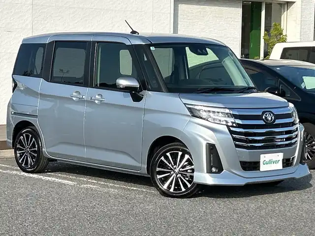 トヨタ ルーミー カスタムG－T 千葉県 2025(令7)年 0.1千km ブライトシルバーM ワンオーナー　９型ディスプレイオーディオ　バックカメラ　ＴＶ　ＥＴＣ　アップルカープレイ　追従クルコン　衝突軽減　両側電動スライドドア　HDMI アイドリングストップ　純正１５インチＡＷ　保証書　取説