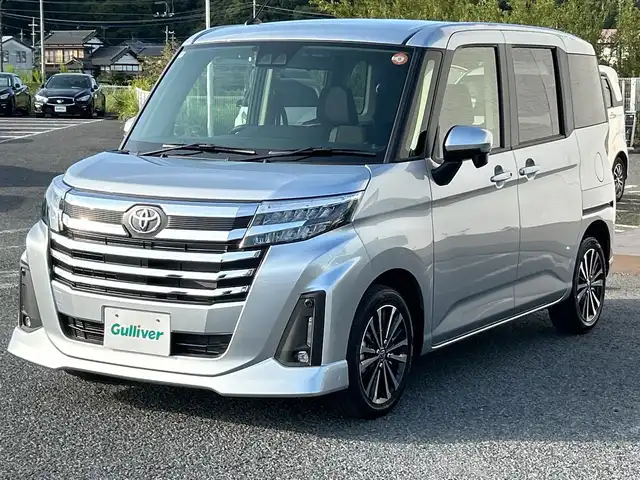 トヨタ ルーミー カスタムG－T 千葉県 2025(令7)年 0.1千km ブライトシルバーM ワンオーナー　９型ディスプレイオーディオ　バックカメラ　ＴＶ　ＥＴＣ　アップルカープレイ　追従クルコン　衝突軽減　両側電動スライドドア　HDMI アイドリングストップ　純正１５インチＡＷ　保証書　取説