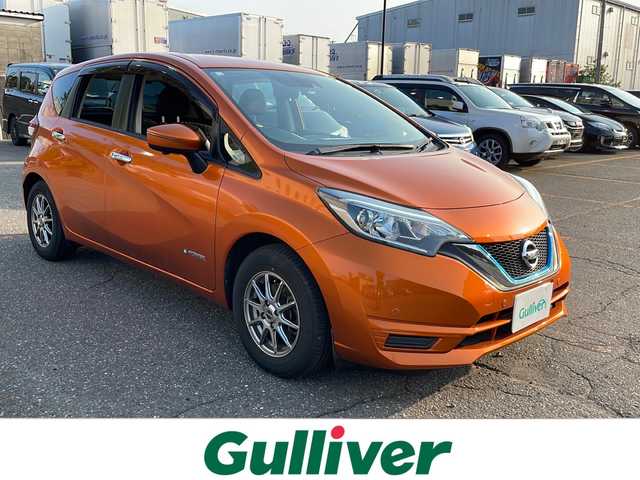 日産 ノート e－パワー X 新潟県 2016(平28)年 3.1万km プレミアムコロナオレンジ 純正SDナビ/(AM/FM/CD/DVD/SD/フルセグ/Bluetooth)/全方位モニター/前方ドライブレコーダー/デジタルインナーミラー/HIDオートライト/社外アルミホイール付冬タイヤ積込/(185/70/R14/6mm)/衝突被害軽減ブレーキ/横滑り防止装置/ステアリングリモコン/純正フロアマット/ドアバイザー/スマートキー/ETC