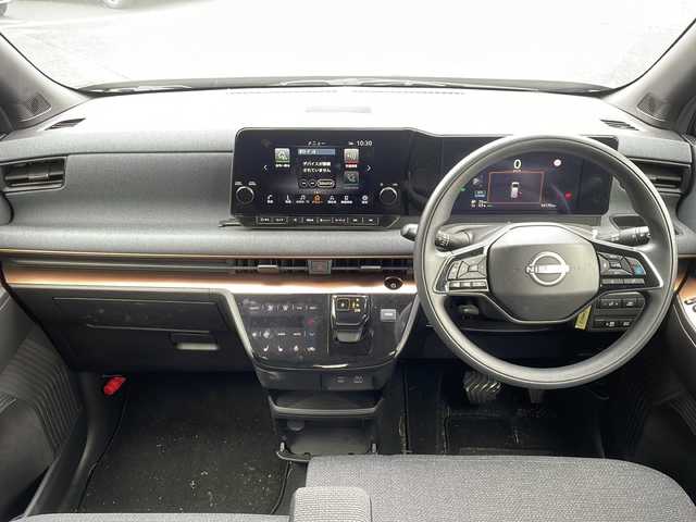 日産 サクラ G 新潟県 2022(令4)年 1.7万km 茶 純正ナビ（Bluetooth/DTV/FM/AM）/全周囲カメラ/プロパイロット/前後コーナーセンサー/D/N席シートヒーター/ビルトインETC2.0/LEDヘッドライト/パーキングアシスト/クルーズコントロール/ステアリングスイッチ/オートライト/オートエアコン/スペアキー×1/保証書/取扱説明書