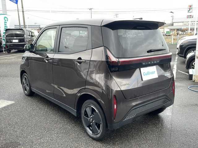 日産 サクラ G 新潟県 2022(令4)年 1.7万km 茶 純正ナビ（Bluetooth/DTV/FM/AM）/全周囲カメラ/プロパイロット/前後コーナーセンサー/D/N席シートヒーター/ビルトインETC2.0/LEDヘッドライト/パーキングアシスト/クルーズコントロール/ステアリングスイッチ/オートライト/オートエアコン/スペアキー×1/保証書/取扱説明書