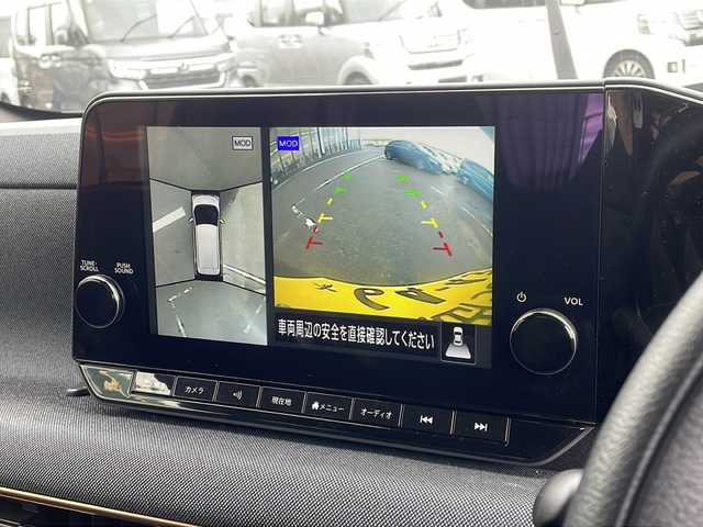 日産 サクラ G 新潟県 2022(令4)年 1.7万km 茶 純正ナビ（Bluetooth/DTV/FM/AM）/全周囲カメラ/プロパイロット/前後コーナーセンサー/D/N席シートヒーター/ビルトインETC2.0/LEDヘッドライト/パーキングアシスト/クルーズコントロール/ステアリングスイッチ/オートライト/オートエアコン/スペアキー×1/保証書/取扱説明書