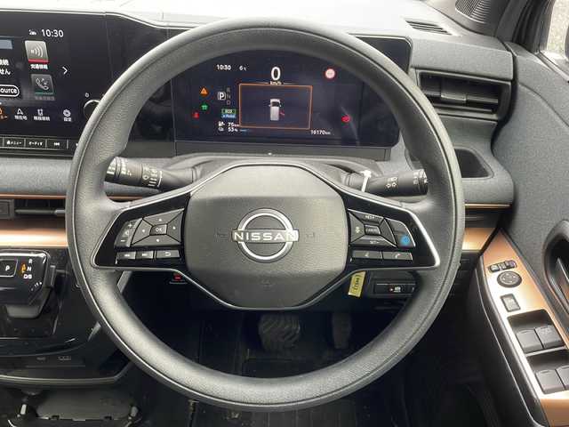 日産 サクラ G 新潟県 2022(令4)年 1.7万km 茶 純正ナビ（Bluetooth/DTV/FM/AM）/全周囲カメラ/プロパイロット/前後コーナーセンサー/D/N席シートヒーター/ビルトインETC2.0/LEDヘッドライト/パーキングアシスト/クルーズコントロール/ステアリングスイッチ/オートライト/オートエアコン/スペアキー×1/保証書/取扱説明書