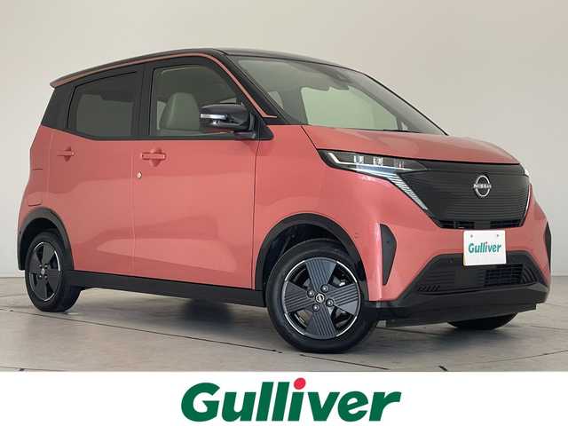 日産 サクラ X 愛知県 2023(令5)年 0.7万km ピンク SDナビ/フルセグ/CD DVD/Bluetooth/バックカメラ/LEDヘッドライト/コーナーセンサー/純正アルミホイール/ステアリングスイッチ/スマートキー/プッシュスタート