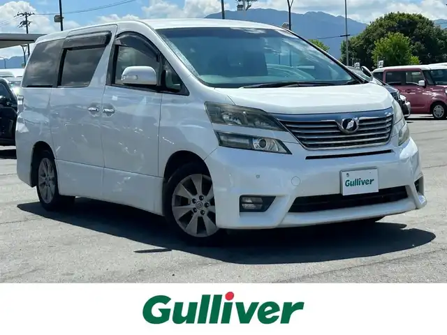 トヨタ ヴェルファイア 2．4Z プラチナセレクションⅡ 奈良県 2010(平22)年 18.5万km ホワイトパールクリスタルシャイン 両側パワースライドドア/純正ナビ(ワンセグTV/CD/DVD/AM・FM/BT/AUX)/純正フリップダウンモニター/バックカメラ/ETC/本革巻きステアリング/純正17インチアルミホイール/純正フロアマット