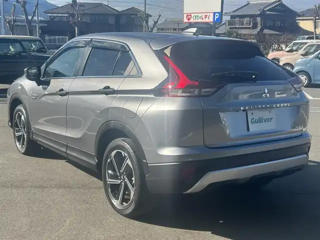 三菱 エクリプス クロス ＰＨＥＶ G 愛媛県 2020(令2)年 2万km チタニウムグレーメタリック 純正ナビ（Bluetooth/フルセグTV）/アラウンドビューモニター/AppleCarPlay/AndroidAuto/アダプティブクルーズコントロール/ETC2.0/パワーシート/ハーフレザーシート/シートヒーター/ブラインドスポットモニター/ステアリングヒーター/ドライブモード/純正18インチアルミホイール/前後ドライブレコーダー/前後コーナーセンサー/オートマチックハイビーム/LEDヘッドライト/スマートキー×２