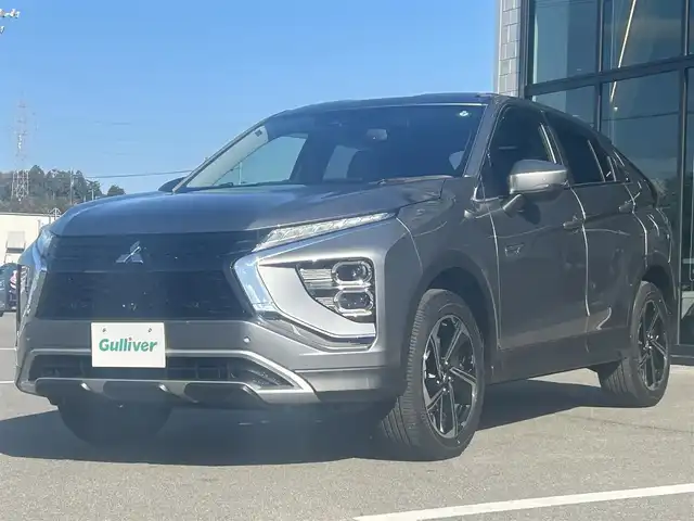 三菱 エクリプス クロス ＰＨＥＶ G 愛媛県 2020(令2)年 2万km チタニウムグレーメタリック 純正ナビ（Bluetooth/フルセグTV）/アラウンドビューモニター/AppleCarPlay/AndroidAuto/アダプティブクルーズコントロール/ETC2.0/パワーシート/ハーフレザーシート/シートヒーター/ブラインドスポットモニター/ステアリングヒーター/ドライブモード/純正18インチアルミホイール/前後ドライブレコーダー/前後コーナーセンサー/オートマチックハイビーム/LEDヘッドライト/スマートキー×２
