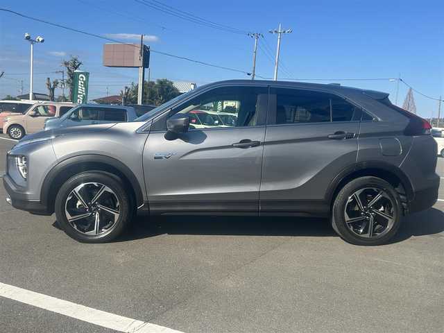 三菱 エクリプス クロス ＰＨＥＶ G 愛媛県 2020(令2)年 2万km チタニウムグレーメタリック 純正ナビ（Bluetooth/フルセグTV）/アラウンドビューモニター/AppleCarPlay/AndroidAuto/アダプティブクルーズコントロール/ETC2.0/パワーシート/ハーフレザーシート/シートヒーター/ブラインドスポットモニター/ステアリングヒーター/ドライブモード/純正18インチアルミホイール/前後ドライブレコーダー/前後コーナーセンサー/オートマチックハイビーム/LEDヘッドライト/スマートキー×２