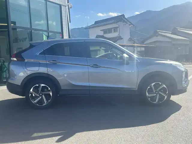 三菱 エクリプス クロス ＰＨＥＶ G 愛媛県 2020(令2)年 2万km チタニウムグレーメタリック 純正ナビ（Bluetooth/フルセグTV）/アラウンドビューモニター/AppleCarPlay/AndroidAuto/アダプティブクルーズコントロール/ETC2.0/パワーシート/ハーフレザーシート/シートヒーター/ブラインドスポットモニター/ステアリングヒーター/ドライブモード/純正18インチアルミホイール/前後ドライブレコーダー/前後コーナーセンサー/オートマチックハイビーム/LEDヘッドライト/スマートキー×２