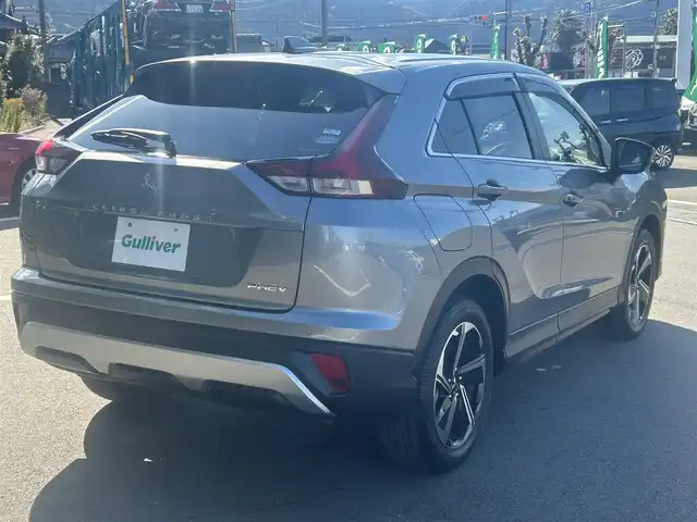 三菱 エクリプス クロス ＰＨＥＶ G 愛媛県 2020(令2)年 2万km チタニウムグレーメタリック 純正ナビ（Bluetooth/フルセグTV）/アラウンドビューモニター/AppleCarPlay/AndroidAuto/アダプティブクルーズコントロール/ETC2.0/パワーシート/ハーフレザーシート/シートヒーター/ブラインドスポットモニター/ステアリングヒーター/ドライブモード/純正18インチアルミホイール/前後ドライブレコーダー/前後コーナーセンサー/オートマチックハイビーム/LEDヘッドライト/スマートキー×２