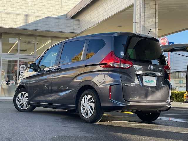 ホンダ フリード G ホンダセンシング 東京都 2019(令1)年 8.7万km モダンスティールM ホンダセンシング/純正HDDナビ フルセグTV/CD DVD Bluetooth/フリップダウンモニター/バックカメラ/両側パワースライドドア/レーダークルーズコントロール/衝突被害軽減ブレーキ/歩行者事故軽減ステアリング/車線維持機能支援システム/路外逸脱抑制機能/先行車発進お知らせ機能/標識認識機能/ETC/ドライブレコーダー/２列目キャプテンシート/マルチインフォメーションディスプレイ/ウレタン製ステアリング/ステアリングスイッチ（オーディオ）/ホワイト木目調インパネ/パニティミラー/モカファブリック/オートエアコン/アルミホイール付スタッドレスタイヤ車載/保証書＆取扱説明書