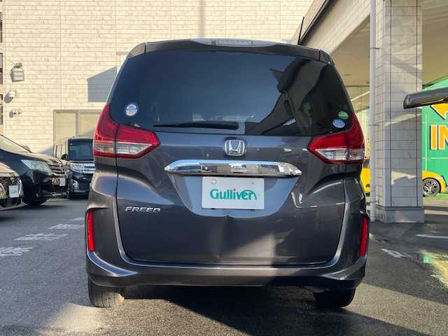 ホンダ フリード G ホンダセンシング 東京都 2019(令1)年 8.7万km モダンスティールM ホンダセンシング/純正HDDナビ フルセグTV/CD DVD Bluetooth/フリップダウンモニター/バックカメラ/両側パワースライドドア/レーダークルーズコントロール/衝突被害軽減ブレーキ/歩行者事故軽減ステアリング/車線維持機能支援システム/路外逸脱抑制機能/先行車発進お知らせ機能/標識認識機能/ETC/ドライブレコーダー/２列目キャプテンシート/マルチインフォメーションディスプレイ/ウレタン製ステアリング/ステアリングスイッチ（オーディオ）/ホワイト木目調インパネ/パニティミラー/モカファブリック/オートエアコン/アルミホイール付スタッドレスタイヤ車載/保証書＆取扱説明書