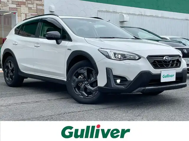 スバル ＸＶ ハイブリッド アドバンス スタイルエディション 徳島県 2022(令4)年 1.9万km クリスタルホワイトP 純正ナビ(CN-FX810D)/(CD・DVD・BD/Bluetooth/TV)/フロント・サイド・バックカメラ/社外ETC/ステアリングスイッチ/衝突被害軽減システム/追従機能付クルーズコントロール/レーンキープアシスト/ダウンヒルアシストコントロール/LEDヘッドライト/フロントフォグライト/オートライト/ハーフレザーシート/前席パワーシート/前席シートヒーター/D席シートメモリー/電動パーキングブレーキ/純正18インチアルミホイール/ルーフレール/USB充電/スマートキー/スペアキー