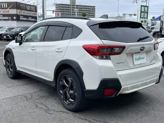 スバル ＸＶ ハイブリッド アドバンス スタイルエディション 徳島県 2022(令4)年 1.9万km クリスタルホワイトP 純正ナビ(CN-FX810D)/(CD・DVD・BD/Bluetooth/TV)/フロント・サイド・バックカメラ/社外ETC/ステアリングスイッチ/衝突被害軽減システム/追従機能付クルーズコントロール/レーンキープアシスト/ダウンヒルアシストコントロール/LEDヘッドライト/フロントフォグライト/オートライト/ハーフレザーシート/前席パワーシート/前席シートヒーター/D席シートメモリー/電動パーキングブレーキ/純正18インチアルミホイール/ルーフレール/USB充電/スマートキー/スペアキー