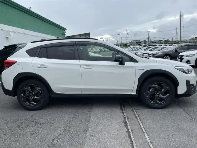 スバル ＸＶ ハイブリッド アドバンス スタイルエディション 徳島県 2022(令4)年 1.9万km クリスタルホワイトP 純正ナビ(CN-FX810D)/(CD・DVD・BD/Bluetooth/TV)/フロント・サイド・バックカメラ/社外ETC/ステアリングスイッチ/衝突被害軽減システム/追従機能付クルーズコントロール/レーンキープアシスト/ダウンヒルアシストコントロール/LEDヘッドライト/フロントフォグライト/オートライト/ハーフレザーシート/前席パワーシート/前席シートヒーター/D席シートメモリー/電動パーキングブレーキ/純正18インチアルミホイール/ルーフレール/USB充電/スマートキー/スペアキー