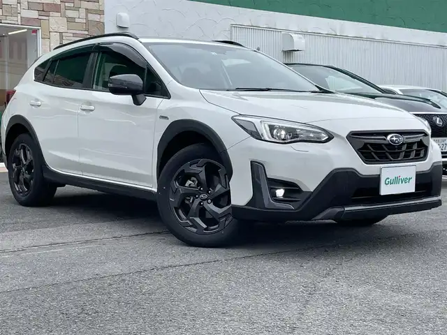 スバル ＸＶ ハイブリッド アドバンス スタイルエディション 徳島県 2022(令4)年 1.9万km クリスタルホワイトP 純正ナビ(CN-FX810D)/(CD・DVD・BD/Bluetooth/TV)/フロント・サイド・バックカメラ/社外ETC/ステアリングスイッチ/衝突被害軽減システム/追従機能付クルーズコントロール/レーンキープアシスト/ダウンヒルアシストコントロール/LEDヘッドライト/フロントフォグライト/オートライト/ハーフレザーシート/前席パワーシート/前席シートヒーター/D席シートメモリー/電動パーキングブレーキ/純正18インチアルミホイール/ルーフレール/USB充電/スマートキー/スペアキー