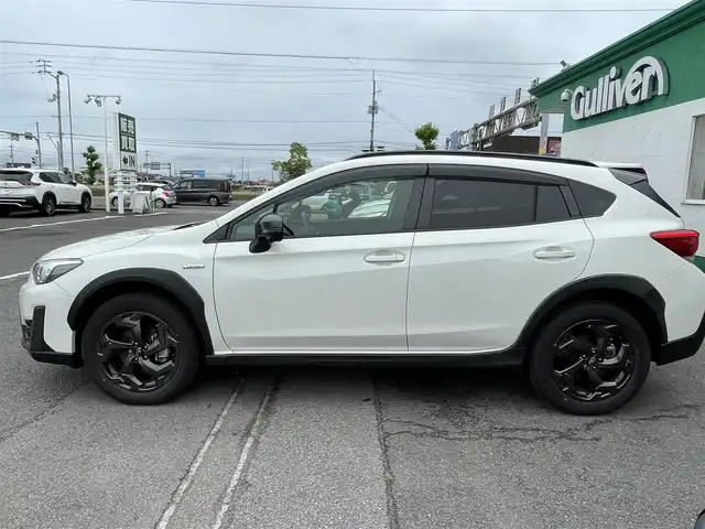 スバル ＸＶ ハイブリッド アドバンス スタイルエディション 徳島県 2022(令4)年 1.9万km クリスタルホワイトP 純正ナビ(CN-FX810D)/(CD・DVD・BD/Bluetooth/TV)/フロント・サイド・バックカメラ/社外ETC/ステアリングスイッチ/衝突被害軽減システム/追従機能付クルーズコントロール/レーンキープアシスト/ダウンヒルアシストコントロール/LEDヘッドライト/フロントフォグライト/オートライト/ハーフレザーシート/前席パワーシート/前席シートヒーター/D席シートメモリー/電動パーキングブレーキ/純正18インチアルミホイール/ルーフレール/USB充電/スマートキー/スペアキー