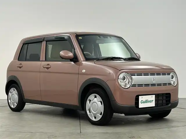 スズキ ラパン L 愛知県 2023(令5)年 1.4万km テラコッタピンクメタリック スズキデュアルブレーキサポート/純正7インチナビ/・フルセグTV/・Bluetooth/パーキングソナー　/シートヒーター/ステアリングリモコン/ディライト/LEDライト/USB