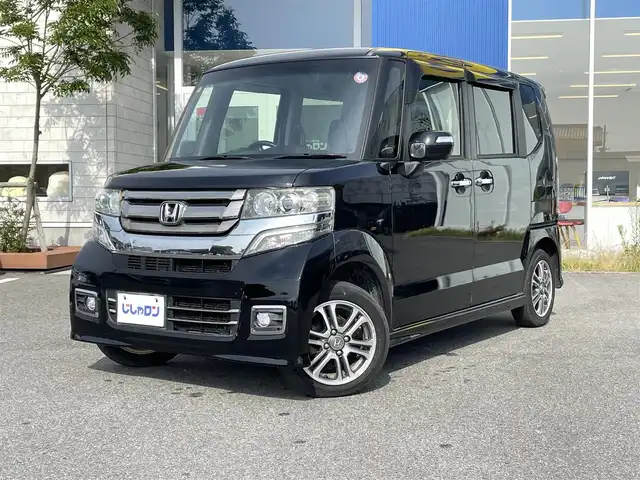 ホンダ Ｎ ＢＯＸ カスタム SSパッケージ 福島県 2015(平27)年 6.4万km クリスタルブラックパール (株)IDOMが運営する【じしゃロンいわき店】の自社ローン専用車両になります。こちらは現金またはオートローンご利用時の価格です。自社ローンご希望の方は別途その旨お申付け下さい/登録時走行距離63555km/ギャザーズ純正ナビゲーション/プッシュスタート/スマートキー/両側パワースライドドア/バックカメラ/シートヒーター/ウィンカーミラー /サイドバイザー/フロアマット/純正アルミホイール