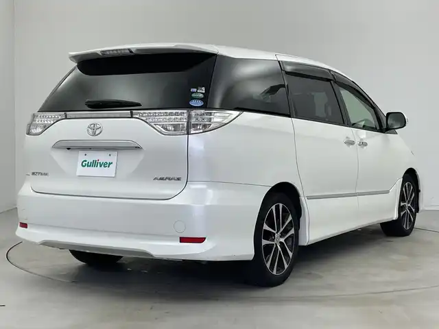 トヨタ エスティマ アエラス プレミアムエディション 新潟県 2016(平28)年 7.5万km ホワイトパールクリスタルシャイン 純正メモリナビ【NSZA-X64T】/　フルセグTV/Bluetooth/CD/DVD/純正フリップダウンモニター/両側パワースライドドア/ハーフレザーシート/D席パワーシート/バックモニター/ビルトインETC/横滑り防止装置/オートライト/レザーステアリング/ステアリングスイッチ