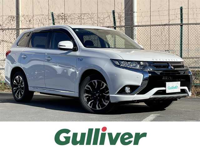 三菱 アウトランダー ＰＨＥＶ G セーフティパッケージ 東京都 2015(平27)年 4.8万km シルキーホワイト カロッツェリアナビ/マルチアラウンドモニター/衝突被害軽減/車線逸脱警報/レーダークルーズコントロール/シートヒーター/ＥＴＣ/ドライブレコーダー/パワーシート/ステアリングスイッチ/スマートキー/障害物センサー/100V電源/ステアリングヒーター/ハーフレザーシート