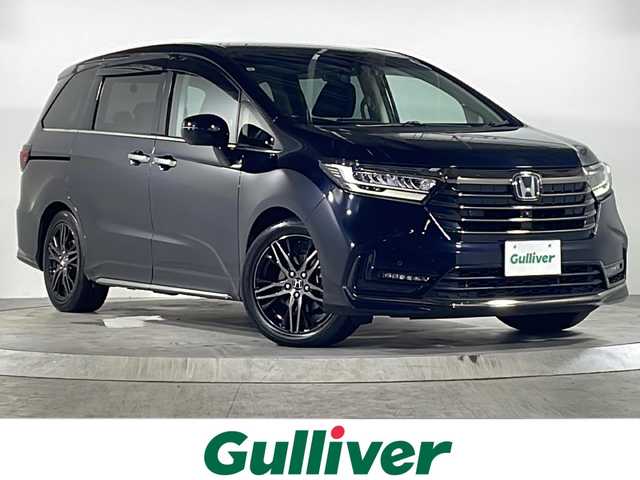 ホンダ オデッセイ ハイブリッド e:HEVアブソルート EX 広島県 2021(令3)年 5.4万km プレミアムヴィーナスブラックP 純正10インチナビ/CD/DVD/DTV/Bluetooth/USB/HDMI/マルチビューカメラ /レーダークルーズコントロール/コーナーセンサー /BSM/LEDオートライト/両側パワースライドドア/ビルトインETC2.0/純正ドライブレコーダー/レーンキープ/ステアリングスイッチ/大型アームレスト/ハーフレザー調シート/シートヒーター /パワーシート/純正フロアマット/ドアバイザー/スマートキー/スペアキー /プッシュスタート