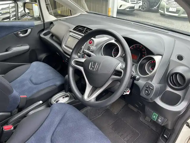 ホンダ フィット G 富山県 2012(平24)年 3.6万km プレミアムホワイトパール ワンオーナー/純正SDナビ/ワンセグテレビ/CD/DVD再生/バックカメラ/キーレスエントリー/純正フロアマット/保証書/取扱説明書/スペアキー×1