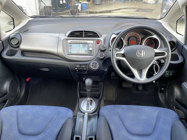 ホンダ フィット G 富山県 2012(平24)年 3.6万km プレミアムホワイトパール ワンオーナー/禁煙車/純正ＳＤナビ/バックカメラ/ＣＤ・ＤＶＤ/ワンセグＴＶ/純正フロアマット/リモコンキー/スペアキー/電動格納ミラー/ハロゲンヘッドライト/保証書