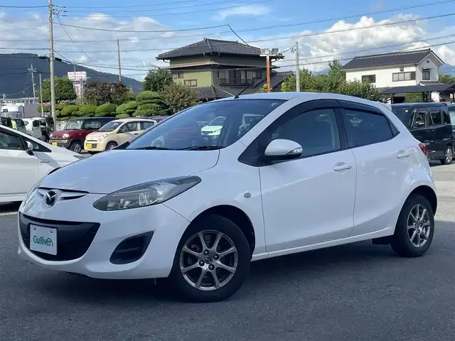 マツダ デミオ 13－スカイアクティブ Sスター 山梨県 2013(平25)年 10.4万km クリスタルホワイトパールマイカ ワンオーナー/社外メモリナビ/Bluetooth接続/ETC/純正フロアマット/横滑り防止装置/盗難防止装置/取扱説明書/保証書