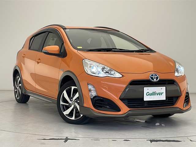 トヨタ アクア X－URBAN 沖縄県 2015(平27)年 6.8万km オレンジパールクリスタルシャイン 純正ナビ(NSZT-W64)/（フルセグTV　DVD再生　Bluetooth接続）/バックカメラ/ビルトインETC/前後ドライブレコーダー/ハーフレザーシート/スマートキー/プッシュスタート/純正フロアマット/ドアバイザー/純正16インチアルミホイール/LEDヘッドライト/オートライト