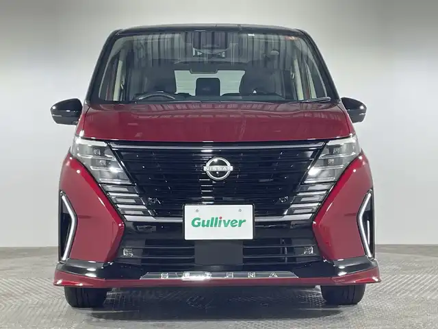 日産 セレナ ハイウェイスター V 神奈川県 2023(令5)年 1.5万km 赤Ⅱ ２トーンカラー/純正12.3型ディスプレーオーディオ/メモリーナビ/フルセグ　AM FM Applecarplay　Androidauto　USB　HDMI　/純正フリップダウンモニター/インテリジェントアラウンドビューモニター/インテリジェントルームミラー/両側電動スライドドア/360度セーフティアシスト/プロパイロット/レーダークルーズコントロール/前方衝突予測警報/インテリジェントエマージェンシーブレーキ/車線逸脱防止支援システム/後側方車両検知警報/後側方衝突防止支援システム/ふらつき警報/衝突回避ステアリングアシスト/車線逸脱警報/後退時車両検知警報/踏み間違い衝突防止アシスト/前後ソナー/SOSコール/ETC2.0/純正前後ドライブレコーダー/アイドリングストップ/革巻きステアリング/パドルシフト/ステアリングヒーター/前席/2列目左右シートヒーター/2列目3列目シートバックテーブル/USBソケット/プッシュスタート/スマートキー/オートハイビーム/アダブティブLEDヘッドライト/オートライト/純正フロント/サイド/リアスポイラー