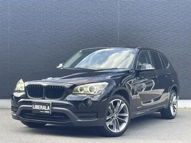 ＢＭＷ Ｘ１ sDrive 20i 大分県 2013(平25)年 10.1万km サファイアブラックP 取扱説明書/保証書/純正ナビ/Bluetooth/CD/DVD/AUX/USB/キセノンヘッドライト/オートライト/アイドリングストップ/プッシュスタート/純正18インチAW/ドライブレコーダー前後/ETC