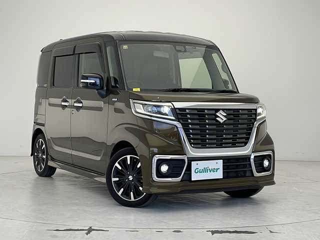 スズキ スペーシア カスタム HYBRID XS ターボ 沖縄県 2018(平30)年 7.7万km ブレイブカーキパール/ブラック2トーン 社外ディスプレイオーディオ（カロッツェリアFH-8500DVS）　/Ｂｌｕｅｔｏｏｔｈ/ＤＶＤ/ＣＤ/ＵＳＢ/ETC/バックカメラ/両側パワースライドドア/ドライブレコーダー（ケンウッドDRV-320）/ＬＥＤヘッドライト/リアコーナーセンサー/シートヒーター/ハーフレザーシート/パドルシフト/クルーズコントロール/純正アルミホイール